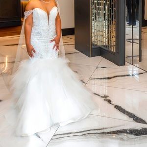 Custom wedding dress. Average dress size 12.